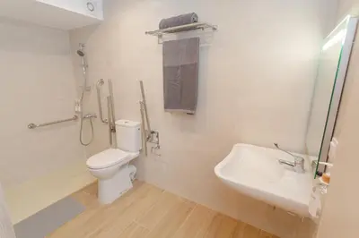 a bathroom with a toilet and a sink at BatFlats - RUZAFA in Valencia