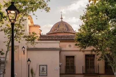a building with a domed roof and a street light at Cozy Up Spain in Valencia