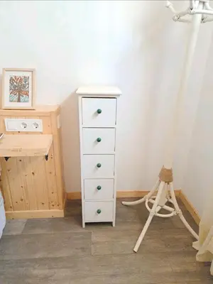 a room with a dresser and a tripod next to a bedroom at APARTAMENTO MARÍTIMO in Valencia