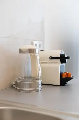 a toaster sitting on top of a kitchen counter at NEW BEACH flats VALENCIA in Valencia