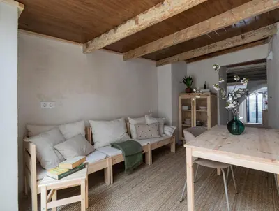 a kitchen with white cabinets and a sink at Calderona Tiny house in Segorbe