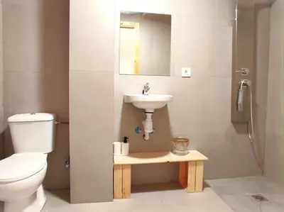 a bathroom with a toilet and a sink and a shower at lifecoliving valencia loft A in Valencia