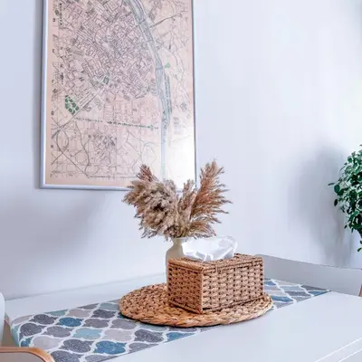 a table with a basket and a map on the wall at Studio Aiora in Valencia