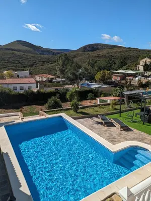 a swimming pool in a villa with a view at Chalet con piscina, barbacoa y jacuzzi en Valencia in Turís