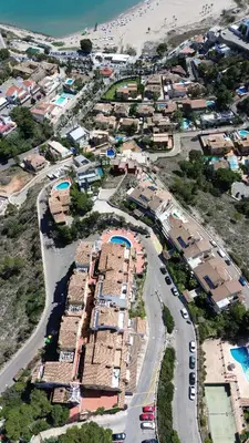 an aerial view of a village with a road and buildings at Cap Blanc Apartment with Sea View and Beach in Cullera