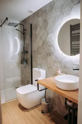 a bathroom with a toilet and a sink and a shower at Acogedor loft en Cabañal playa Malvarosa in Valencia