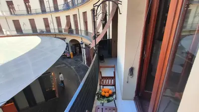 an overhead view of a building with oranges on a table at Reina in Valencia