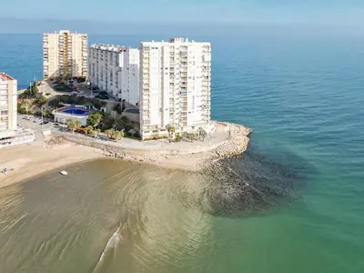 an aerial view of a beach and some buildings at Apartment Orion-2 by Interhome in Cullera