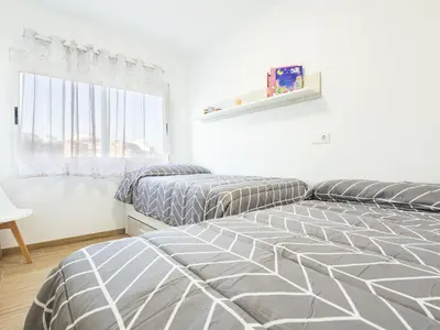 a bedroom with two beds and a window at Apartment Orion-2 by Interhome in Cullera