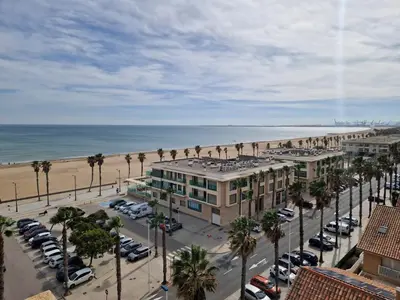 an aerial view of a building and the beach at Playa Patacona con vistas al mar in Valencia