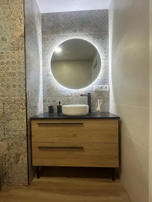 a bathroom with a sink and a mirror at Beach Apartments Valencia 2 in Valencia