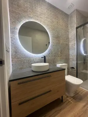 a bathroom with a sink and a mirror at Beach Apartments Valencia 2 in Valencia