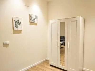 a hallway with a white cabinet in a room at Apartamento en Valencia centro in Valencia