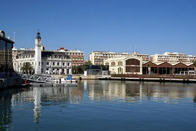 a view of a city with a river and buildings at Las Arenas Suites 2 Playa in Valencia