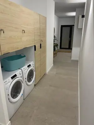 a laundry room with a washer and dryer at Mar&Sol Flats by Vivo GC in Valencia