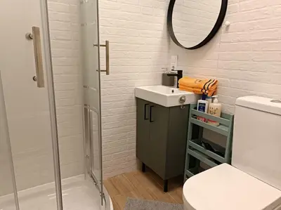 a bathroom with a shower and a sink and a toilet at loft Gilet 20 km Valencia montaña Senderismo Bici in Gilet