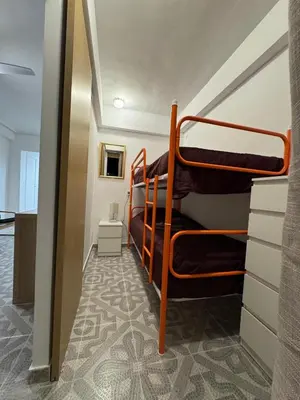 a bedroom with two bunk beds in a room at Apartamento en Cullera in Cullera