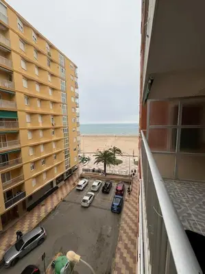 a view of a parking lot from a balcony of a building at Apartamento en Cullera in Cullera
