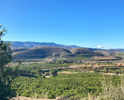 a view of a valley from the hills at Villa Torre Macastre, Valencia in Macastre