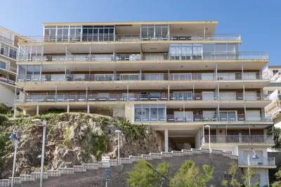 an apartment building on a hill with stairs in front at HAWAI, Esc-2, 3-10 in Cullera