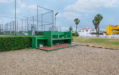a batting cage on a basketball court at Beautiful Apartment In Cullera in Cullera