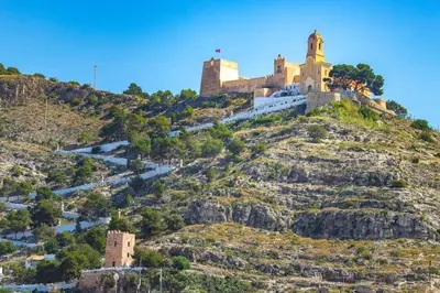 a castle on the top of a mountain at Ubicación ideal in Cullera