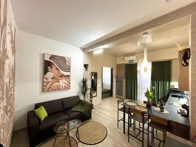 a living room with a couch and a table at Casa Maravillosa in Valencia