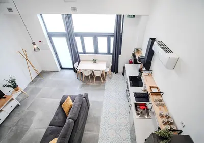 a bathroom with a sink and a mirror at AROMA DE VALENCIA II cozy studio with loft in Valencia
