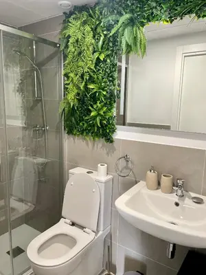 a bathroom with a toilet and a sink at Apartment Gran Canet by GRENT in Canet de Berenguer