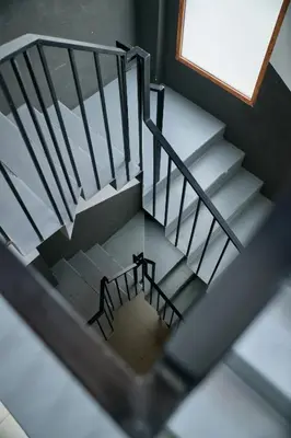 an overhead view of a metal staircase in a building at Loft elegante en Plaza del Carmen F3 in Valencia