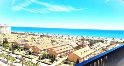 a view of the beach from a balcony of a resort at BEACH VALENCIA LUXURY D9-29 Apartment with terrace and sea views with two rooms in Valencia