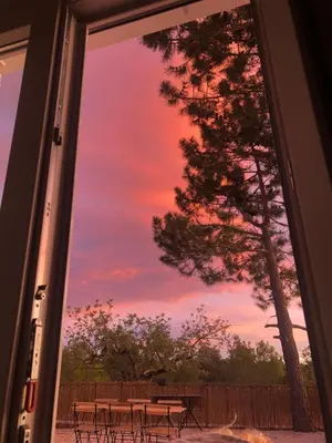 a view of a sunset from a patio window at Casa the Dutchman in Navarrés