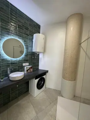 a bathroom with a sink and a mirror at Calma Lofts in Valencia