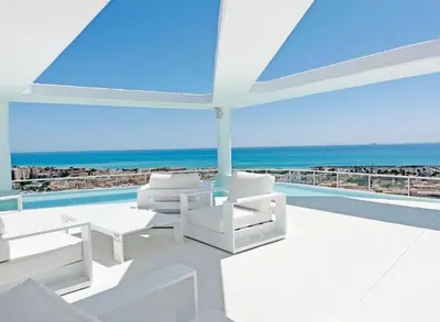 a living room with a view of the ocean at Espectacular apartamento en Gran cannet in Canet de Berenguer