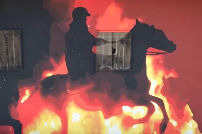 a painting of a person on a horse on fire at Casa rural Puchero y Manta in Alcudia de Veo