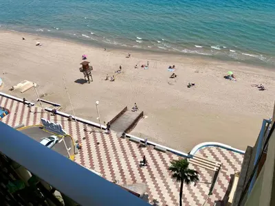 an overhead view of a beach with people on it at Mi Oasis Azul Parking, AC, Fibra, VT-54949-V in Sueca