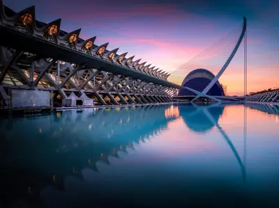 a bridge over a body of water with a building at Mediterraneum Suite D in Valencia