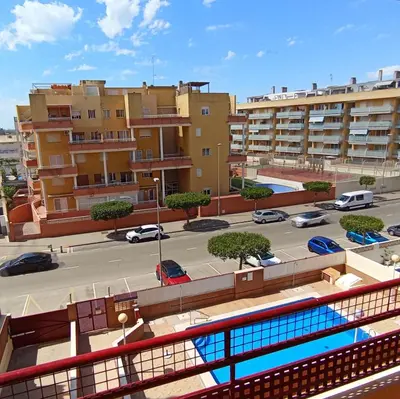 a view of a parking lot with buildings at Apartamento 2 habitaciones playa de Canet de Berenguer in Canet de Berenguer