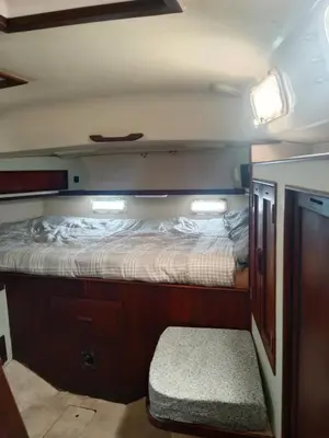 a bedroom with a bed in the back of a boat at Velero Valencia Whimsy in Valencia