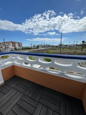 a view of a balcony with plants on it at La Costera in Barrio-Mar