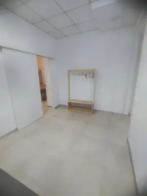 an empty room with a chalkboard on the wall at Valencia Beach PINK in Valencia
