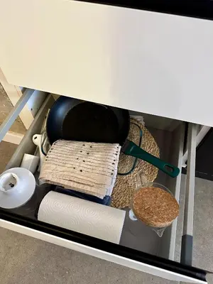 a shelf with towels and other items on it at Loft Camp del Turia A5 - Housevanlive in Valencia