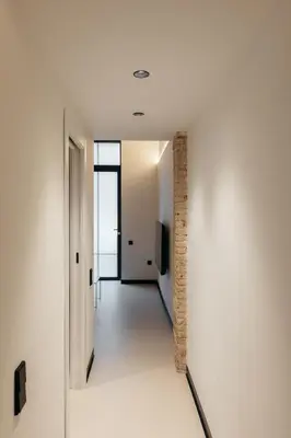 a hallway in a house with a brick wall at Lovely Exclusivity in Valencia Center in Valencia