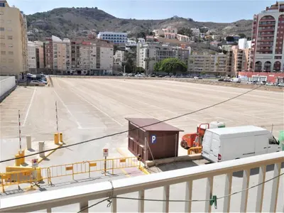 a view of a large parking lot from a building at Amanecer, 1-2 in Cullera
