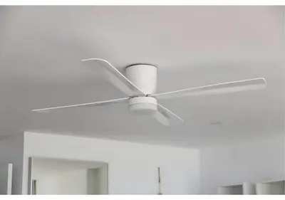 a white ceiling fan sitting in a room at El balcón del mar - 1ª línea y frontal al mar in Cullera