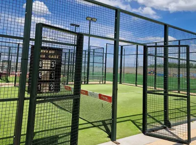 a tennis court with a net on a tennis court at Ca les Rinconetes in Riola