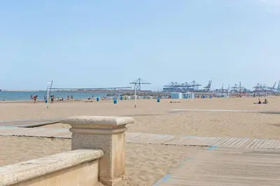 a view of a beach with people on the sand at ApartUP Ca La Leni Beach I in Valencia