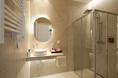 a bathroom with a sink and a shower at Osito Hub - Campoamor in Valencia