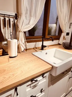 a bathroom with a sink and a window at Villa Valeria, Casa con Cueva privada del 1748 in Requena