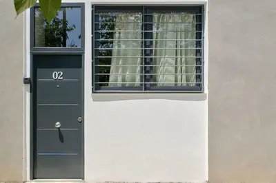 a door to a house with a window at Romantic Apartment N2 Oceanografico Virkin Suites in Valencia